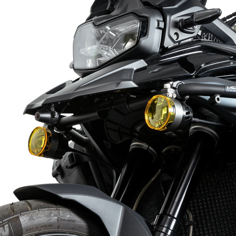 Señal de tráfico con un semicírculo y líneas negras: qué significa y cuándo debes llevar las luces encendidas en moto